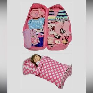 Doll clothes bundle with carting case and bed.